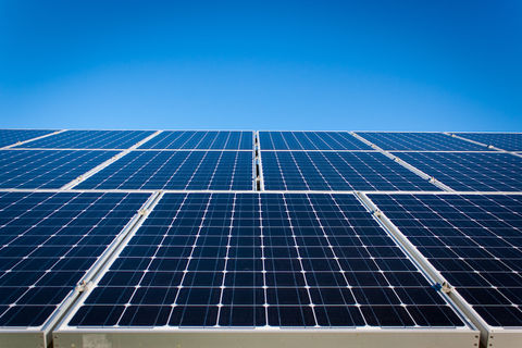 Solar photovoltaic (PV) panels cover a roof